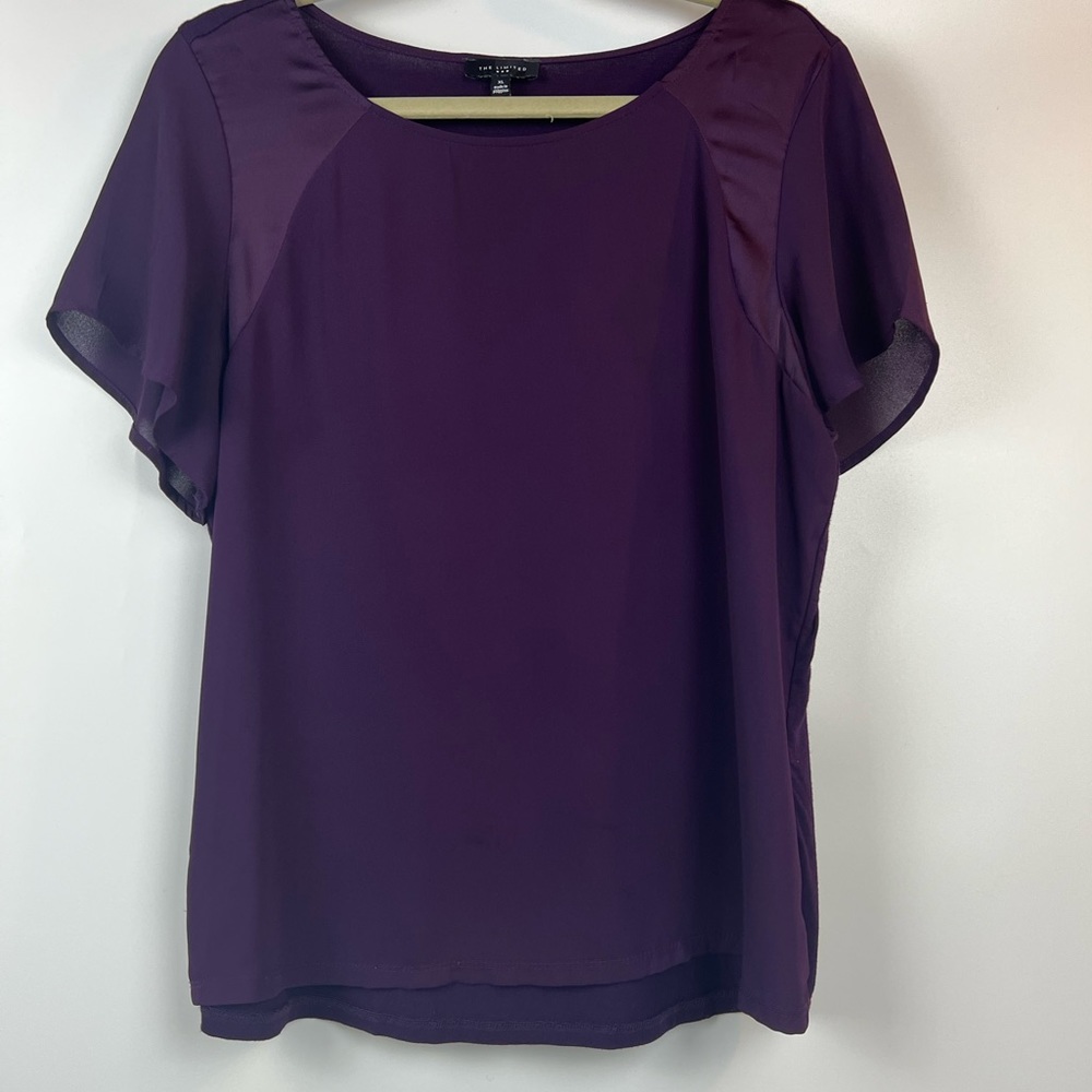 The limited purple short sleeve top. Worn once. Size XL.